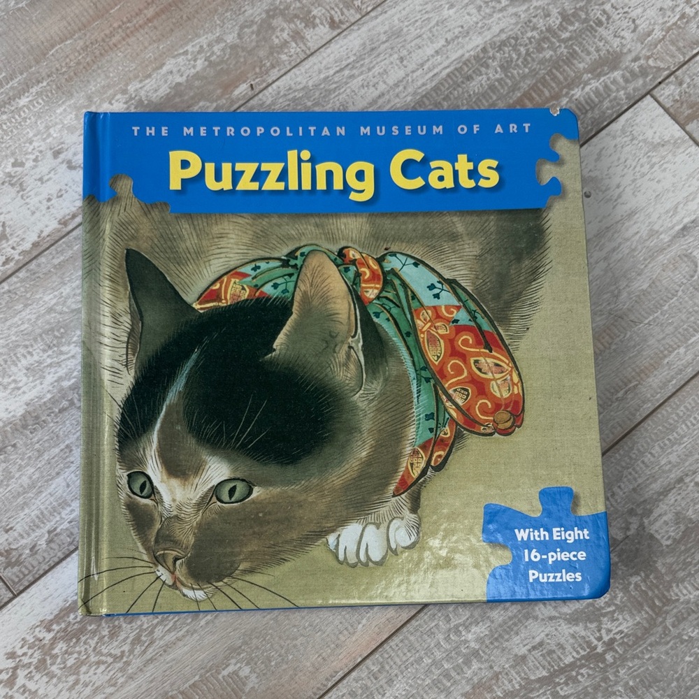 The Metropolitan Museum of Art
Puzzling‎ Cats Book: With Eight 16-piece Puzzles
